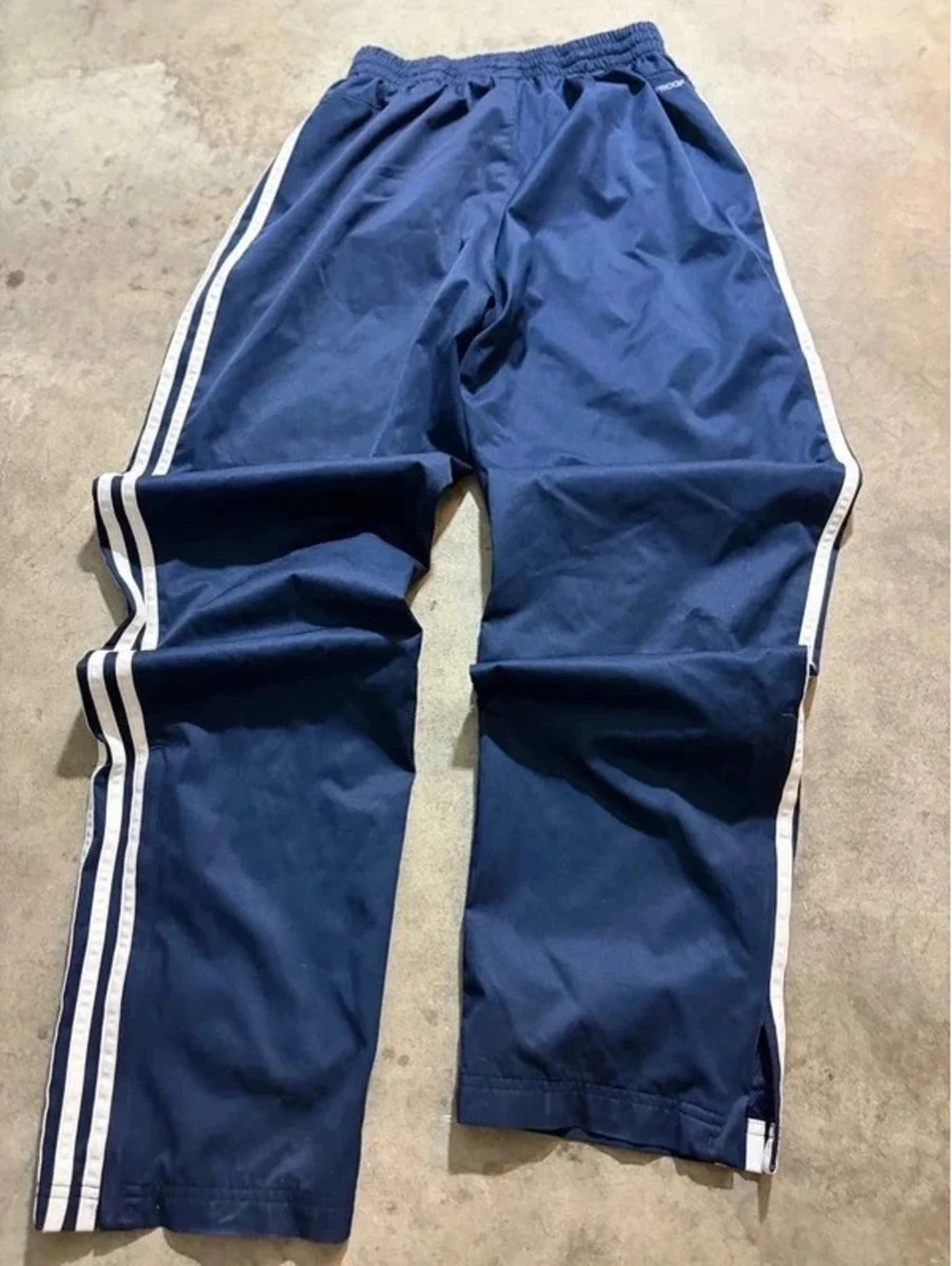 Y2K vintage blue and white striped adidas track pants with zipper on ankle